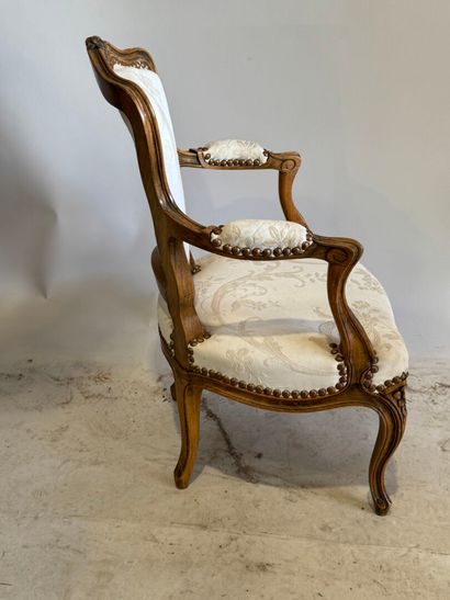 Wooden child's armchair, white silk studded...
