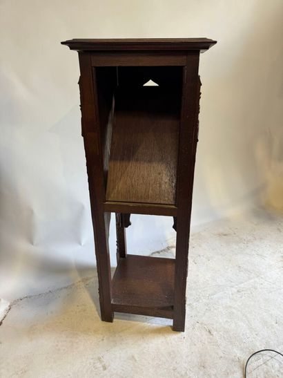 Molded and carved oak sellette, the upper...
