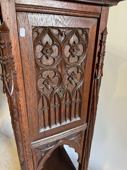 Molded and carved oak sellette, the upper...