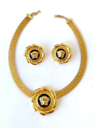 Yellow gold and black enamel half-set decorated...
