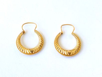 Pair of 18K yellow gold (750‰) creoles with...