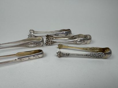 Five sugar tongs in 950/1000 silver, various...