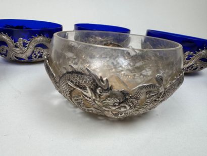 INDOCHINA, 20th century.
Six repoussé silver...