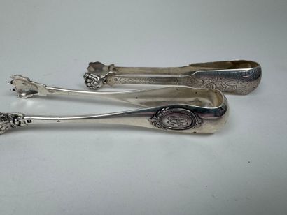 Four sugar tongs in 950/1000 silver, claw...