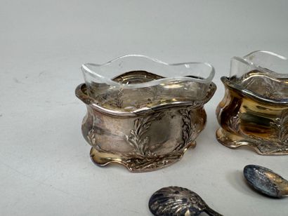 A pair of 950/1000 repoussé silver salerons...