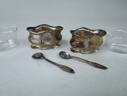 A pair of 950/1000 repoussé silver salerons...