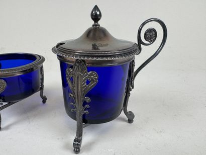Set in finely chased silver decorated with...