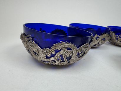 INDOCHINA, 20th century.
Six repoussé silver...
