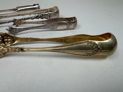 Five sugar tongs in 950/1000 silver, various...