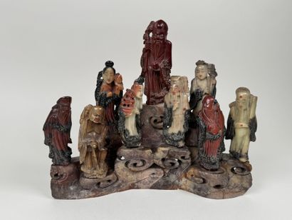 CHINE, vers 1900.
Groupe en pierre dure sculptée...