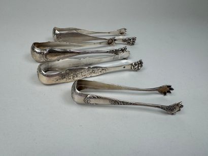 Four sugar tongs in 950/1000 silver, various...