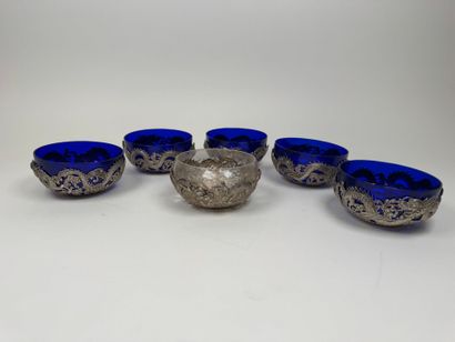 INDOCHINA, 20th century.
Six repoussé silver...