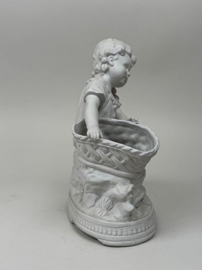 École, XXe.
Enfant aux paniers.
24 x 19 x...