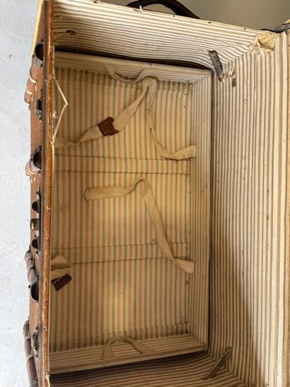 80
H.B.
Travel trunk made of coated canvas,...