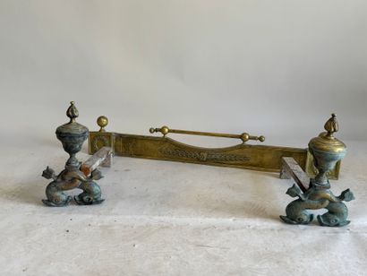 Pair of bronze andirons decorated with stylized...