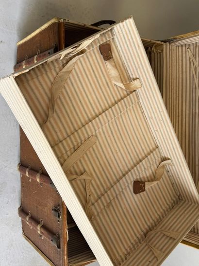 80
H.B.
Travel trunk made of coated canvas,...