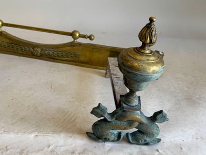 Pair of bronze andirons decorated with stylized...