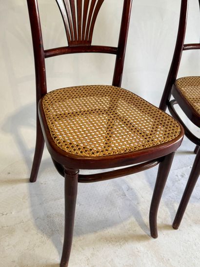 THONET.
Stained wooden bistro chairs with...