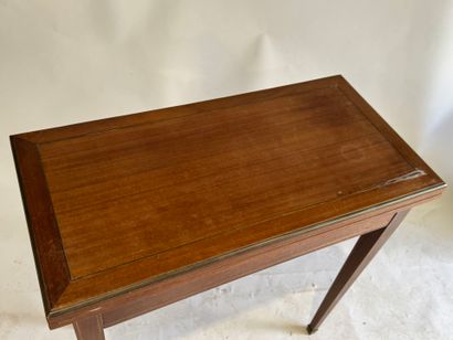 Wood and brass fillet game table opening...