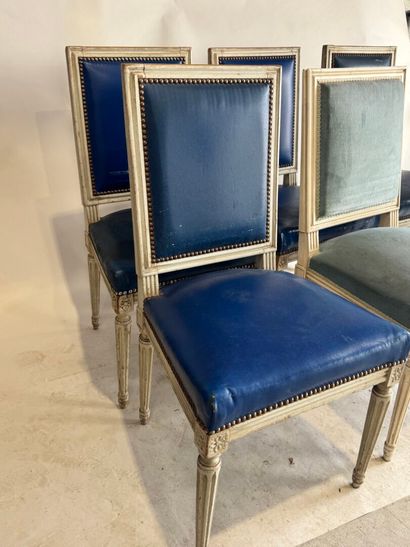 Set of six white-lacquered, molded-wood chairs...