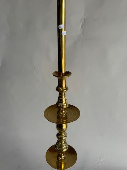 Gold-plated brass candlestick mounted as...