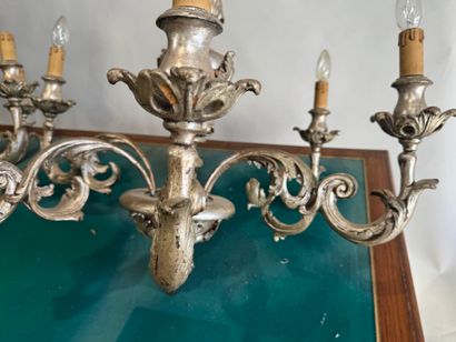 An important pair of six-arm chandeliers...
