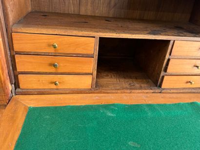 Walnut drop-leaf desk with a veined gray...