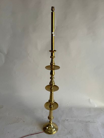 Gold-plated brass candlestick mounted as...