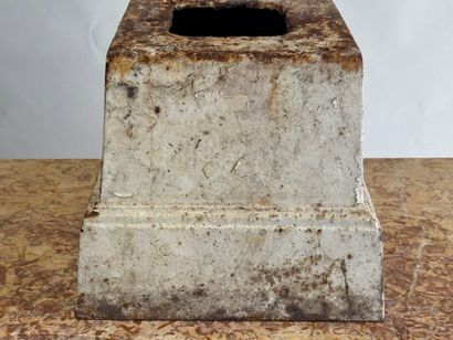 Cast-iron base, formerly lacquered white....