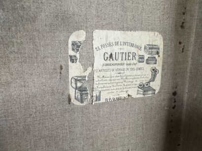 Coated wood, leather and brass travel trunk,...