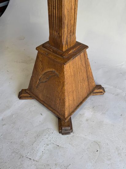 Wooden lectern opening to a flap forming...