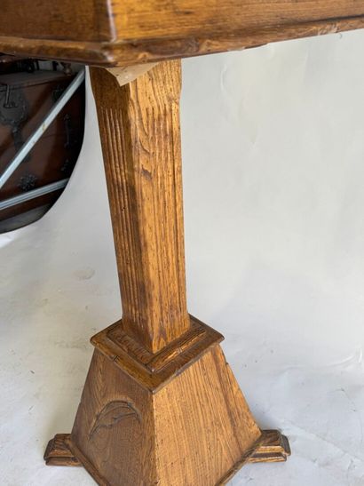 Wooden lectern opening to a flap forming...
