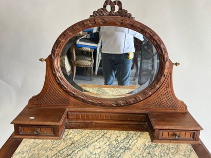 Walnut dressing table with an oval mirror,...