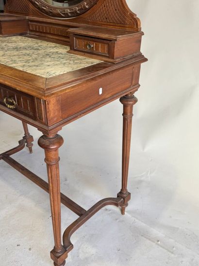 Walnut dressing table with an oval mirror,...