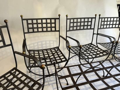 20th century.
Series of 4 openwork wrought-iron...