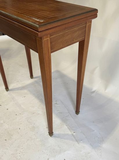 Wood and brass fillet game table opening...