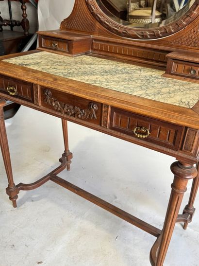 Walnut dressing table with an oval mirror,...
