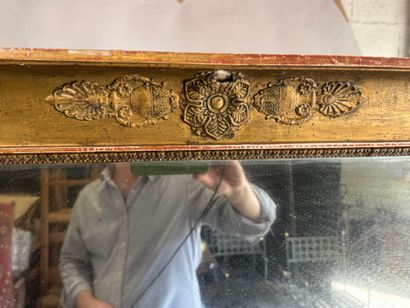 Large wooden mirror with stuccoed and gilded...
