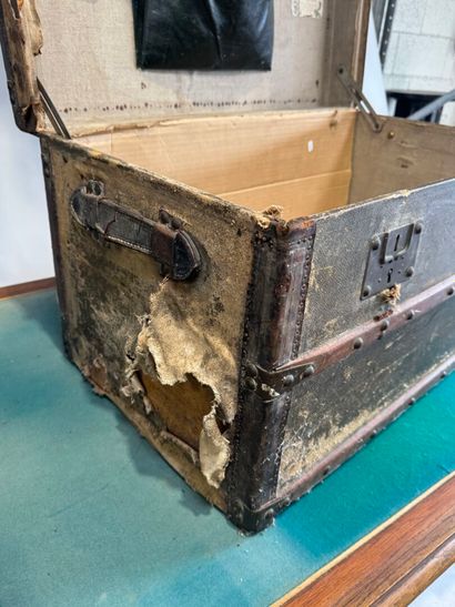 Coated wood, leather and brass travel trunk,...