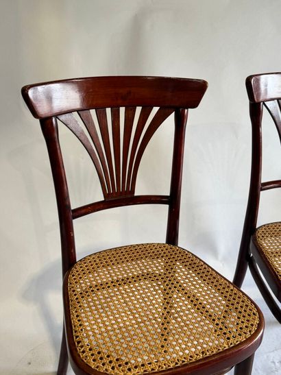 THONET.
Stained wooden bistro chairs with...
