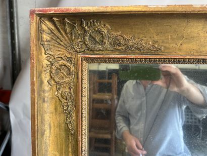 Large wooden mirror with stuccoed and gilded...