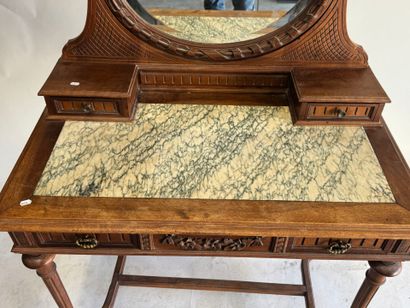 Walnut dressing table with an oval mirror,...