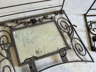 Two entryway coat racks made of openwork...