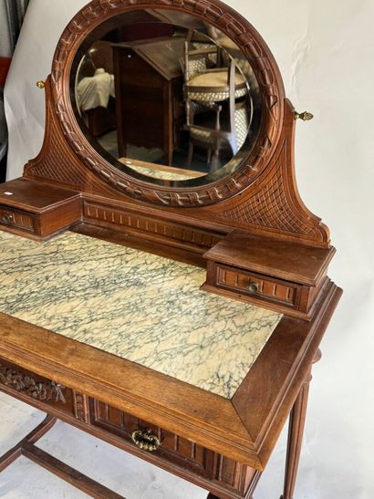 Walnut dressing table with an oval mirror,...