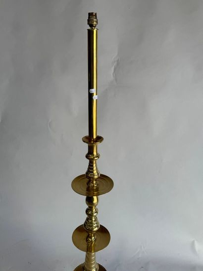 Gold-plated brass candlestick mounted as...