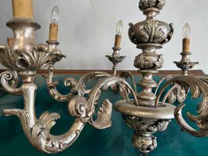 An important pair of six-arm chandeliers...