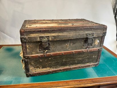 Coated wood, leather and brass travel trunk,...