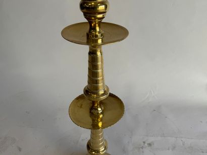 Gold-plated brass candlestick mounted as...