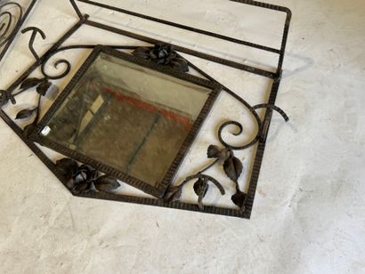 Two entryway coat racks made of openwork...