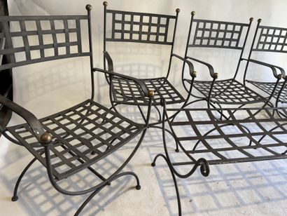 20th century.
Series of 4 openwork wrought-iron...